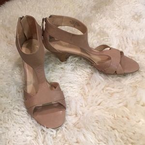 Ankle strap sandals with 2.5” heels.  Back zipper.